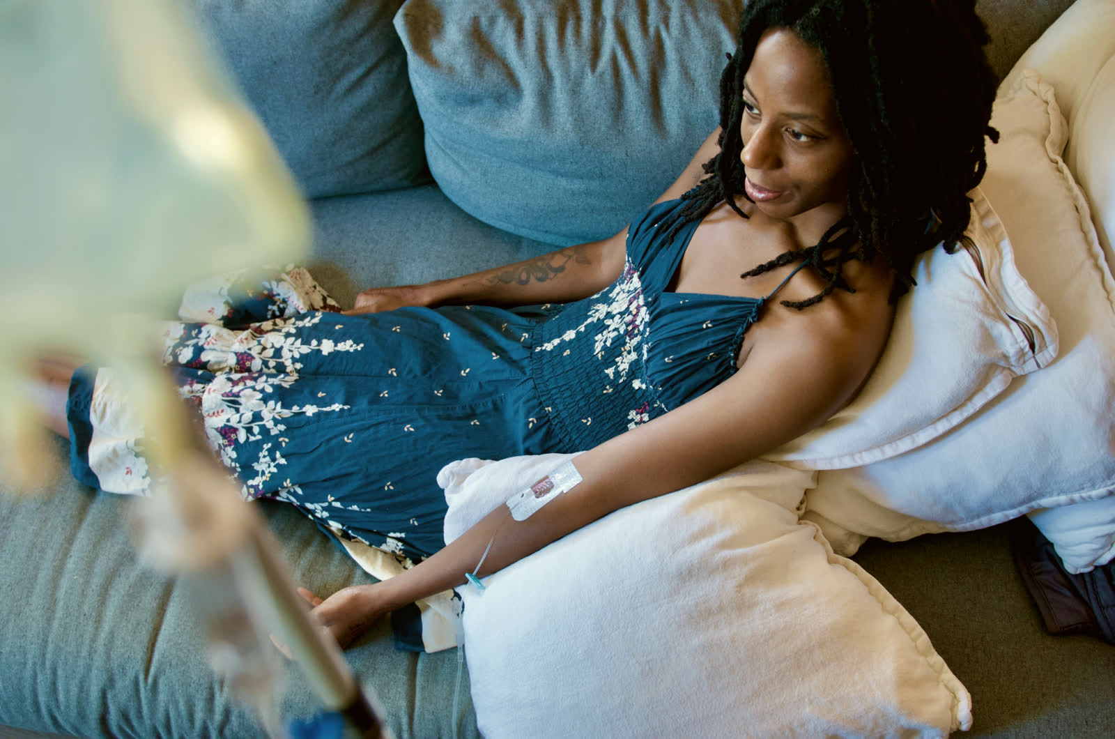 A client relaxing on a couch during a treatment